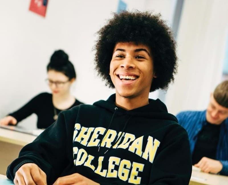 Smiling boy in a classroom
